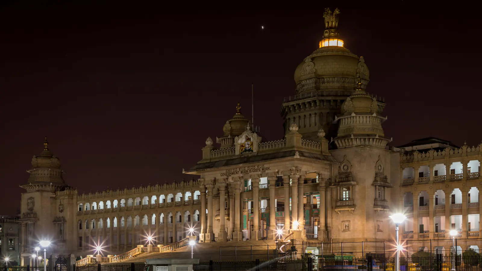 Grand illuminated facade of Vidhana Soudha in Bengaluru.