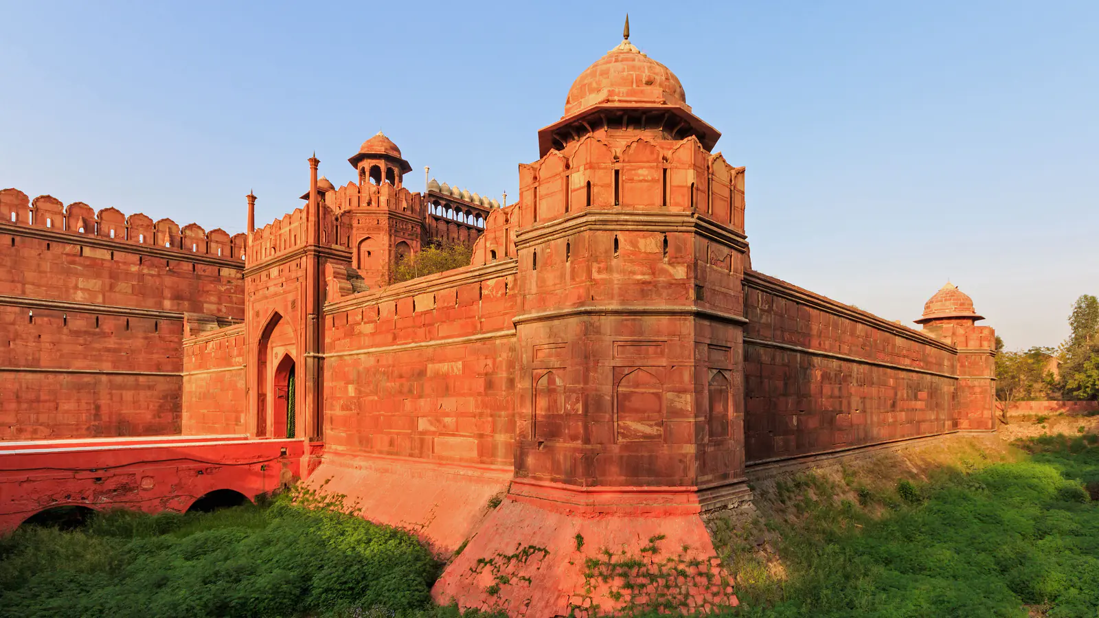 Red sandstone ramparts and domed pavilions of Delhi's Red Fort.